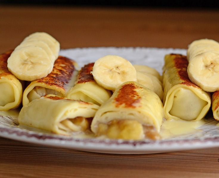 Pfannkuchen mit Bananen und Kondensmilch
